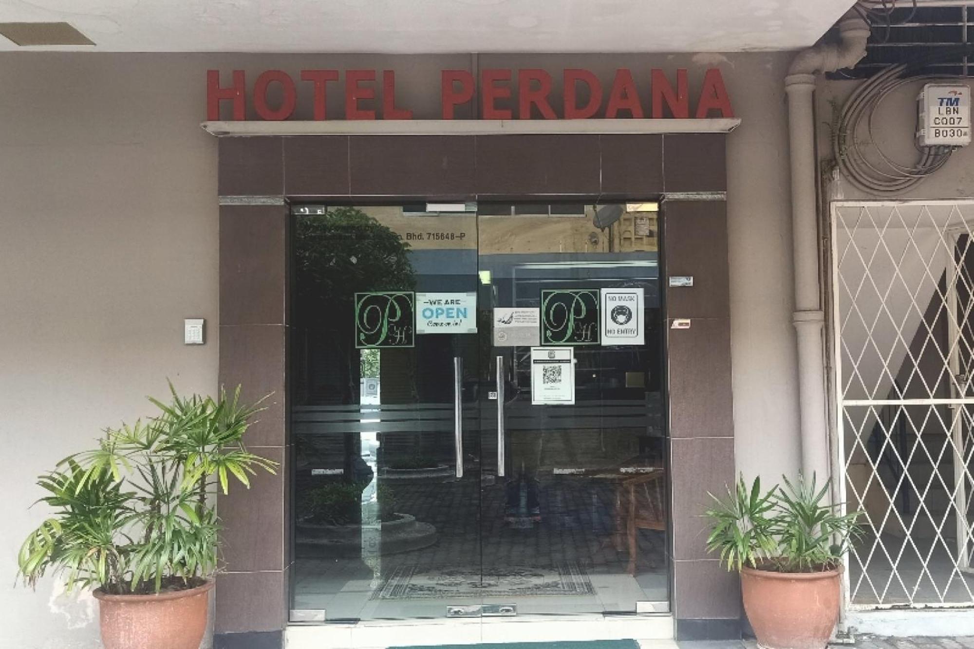Oyo 90411 Perdana Hotel Лабуан Екстериор снимка